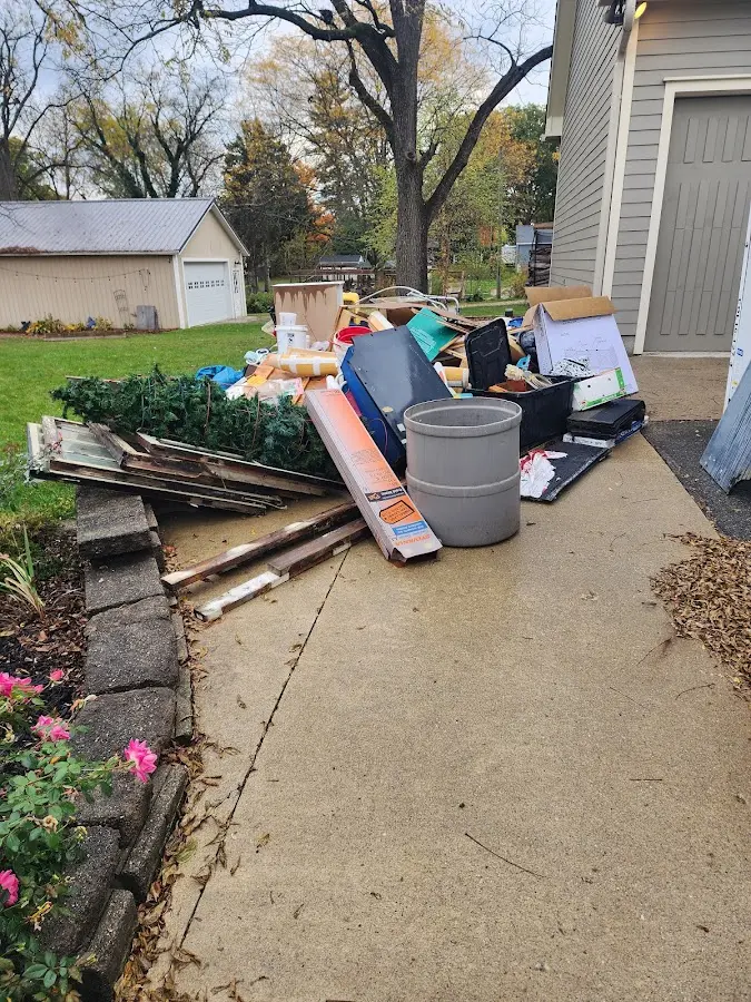 Dumpster being loaded with debris for 3 Yard Dumpster Rental in Brookland